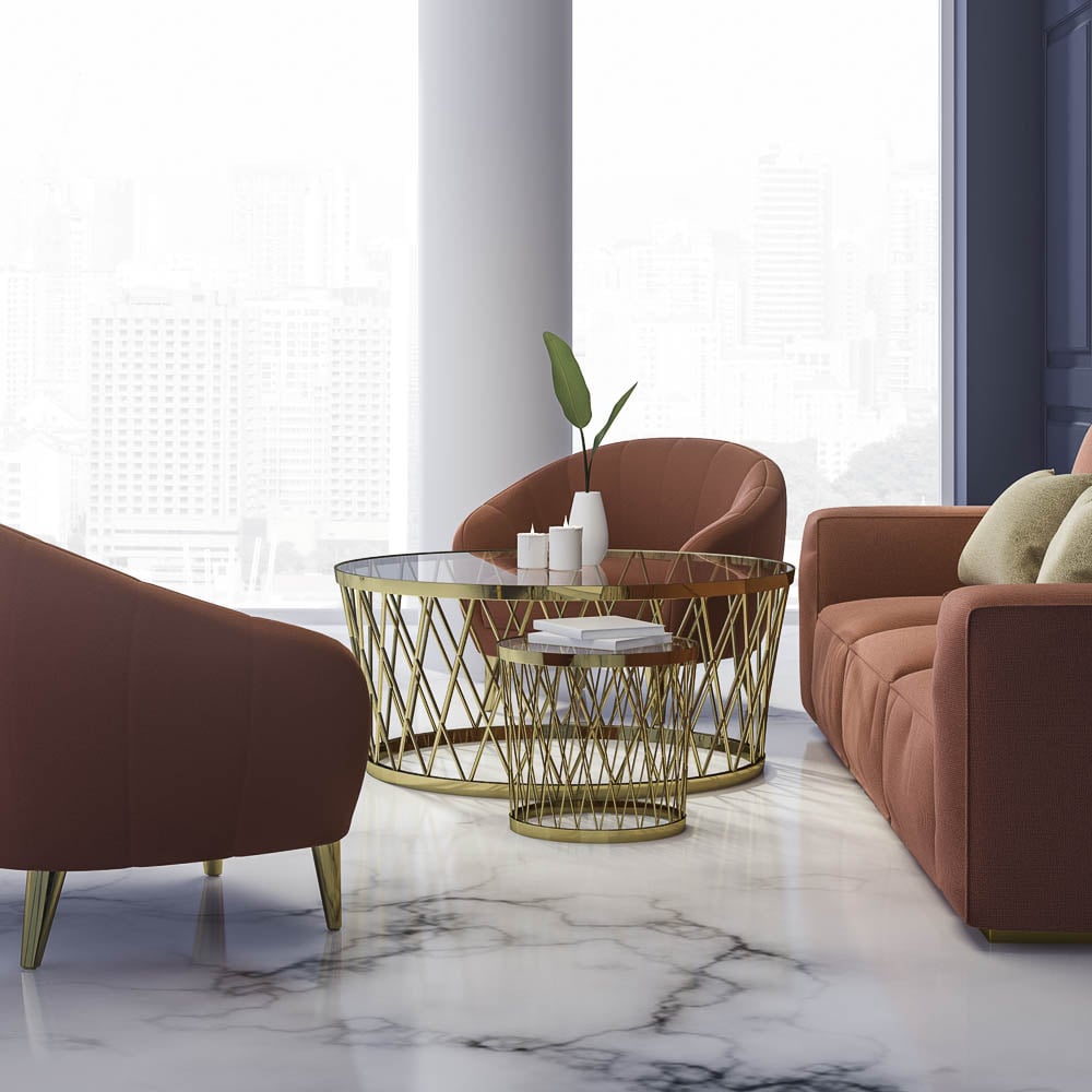 Ein Sofa, zwei Sessel und ein Tisch stehen auf einem stilvoll veredelten Fußboden in Marmor-Optik.